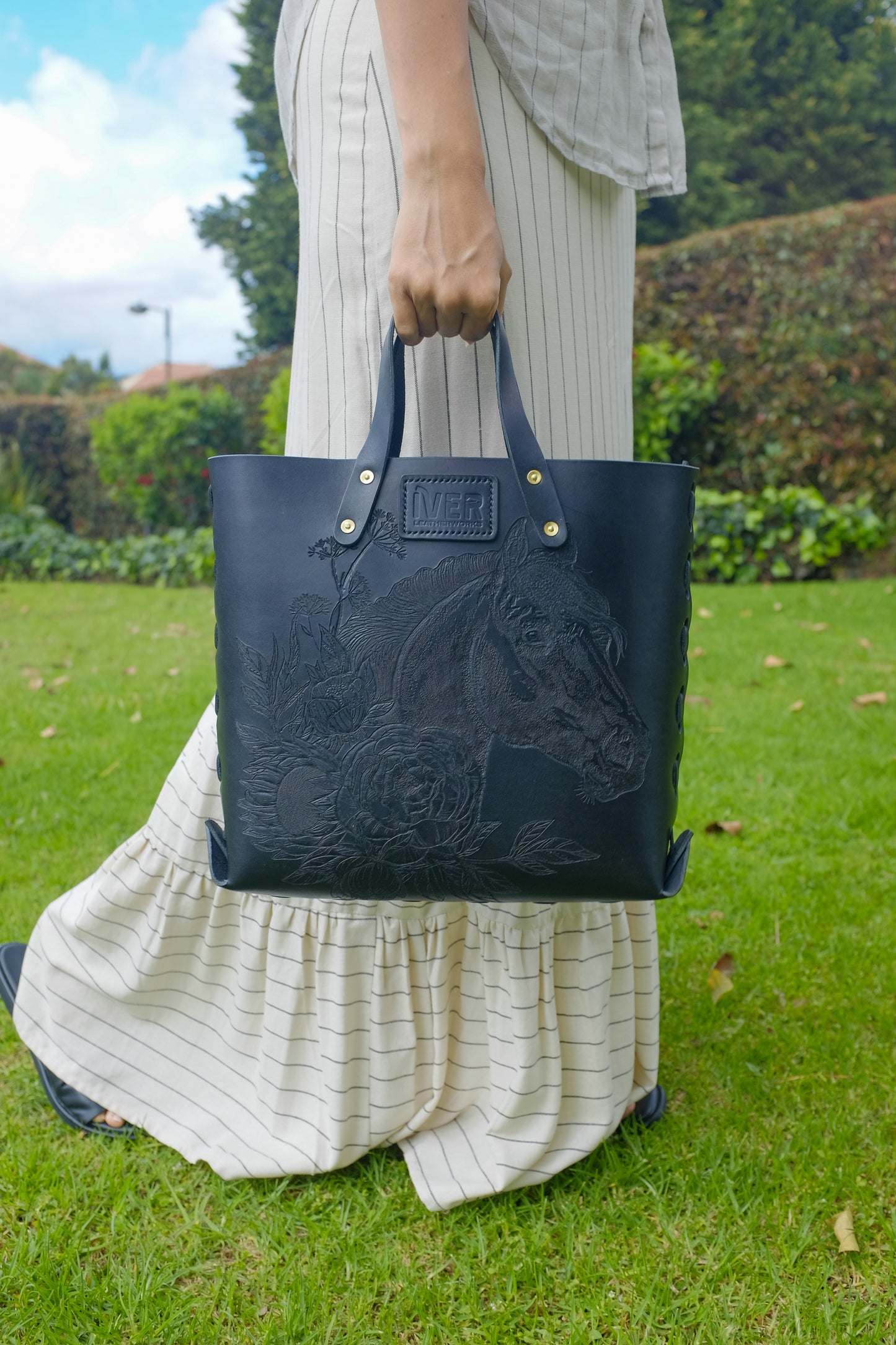 Black Laced Leather Tote with tooled pattern