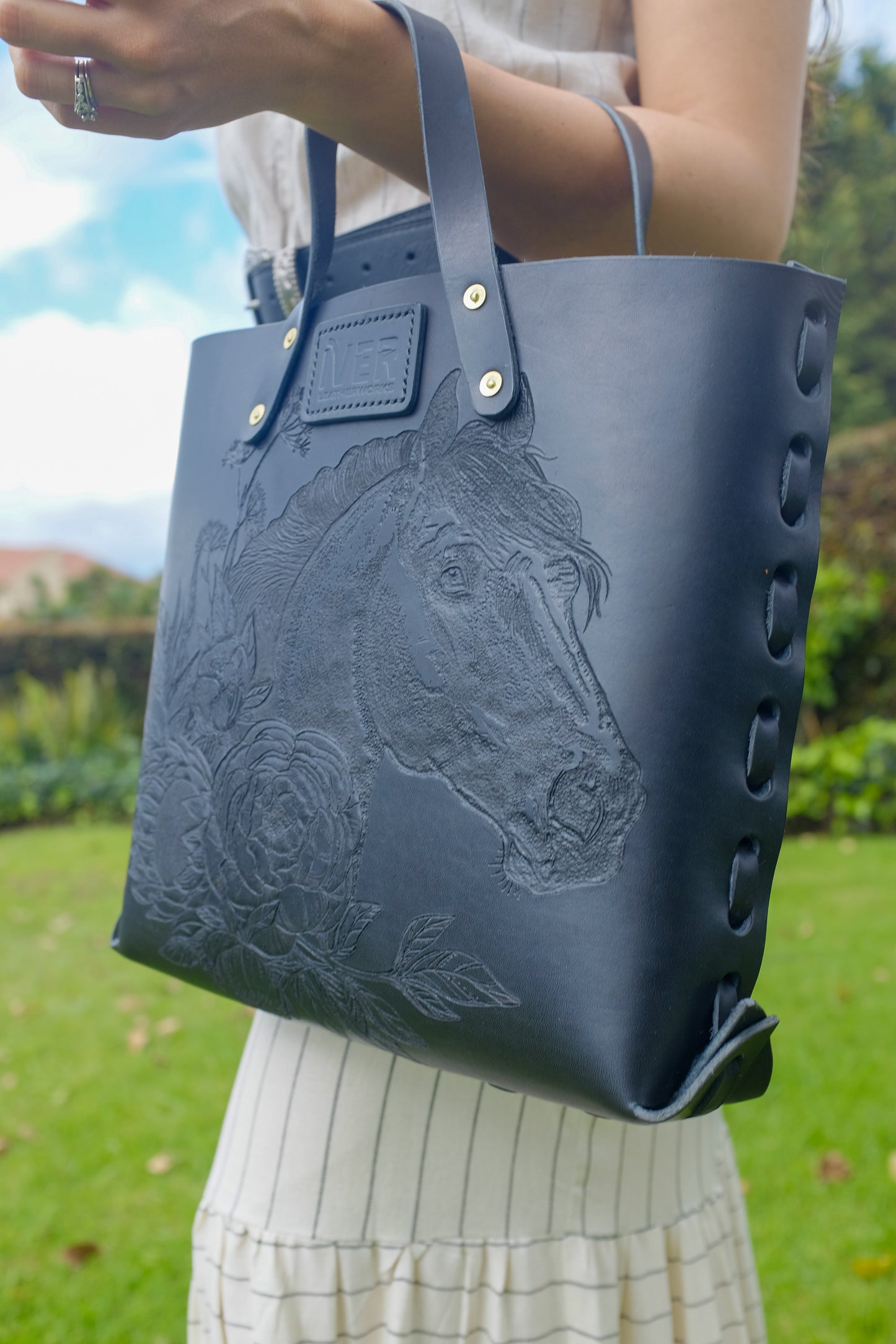 Black Laced Leather Tote with tooled pattern