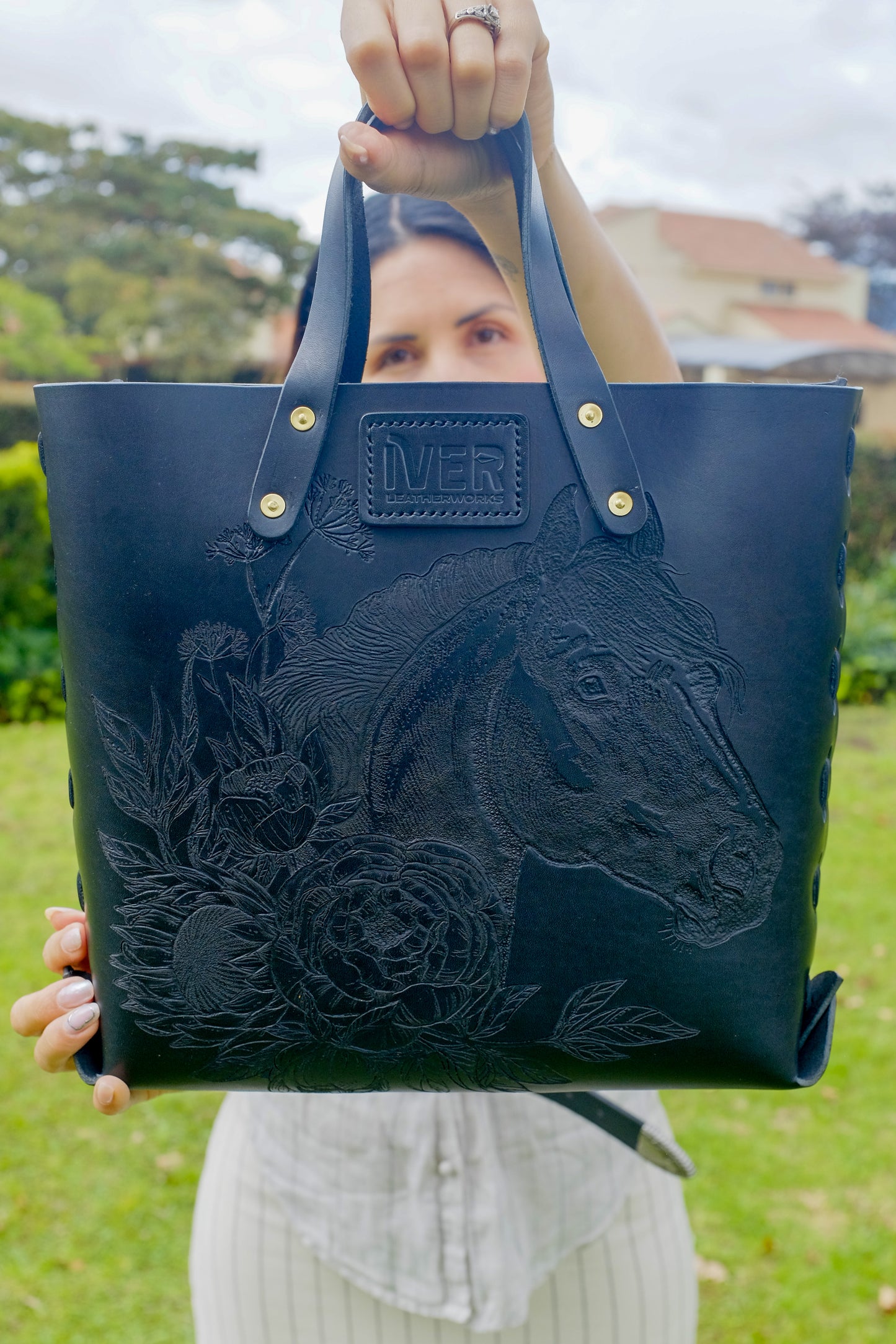 Black Laced Leather Tote with tooled pattern